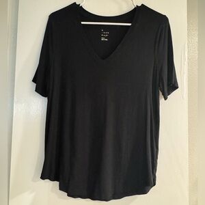 Woman’s Black V-neck